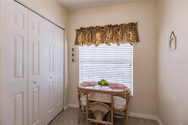 dining area with light tile floors