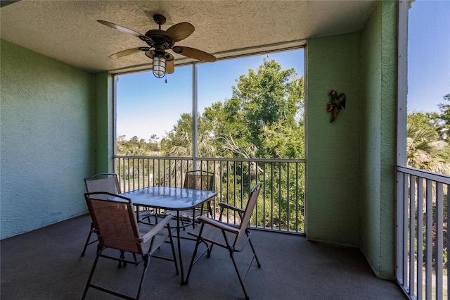 balcony featuring ceiling fan