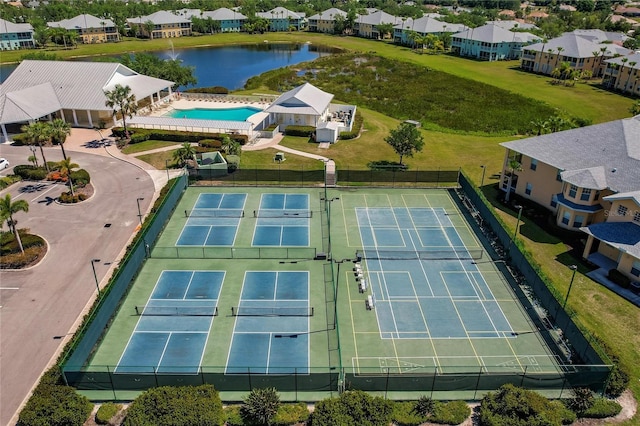 birds eye view of property featuring a water view