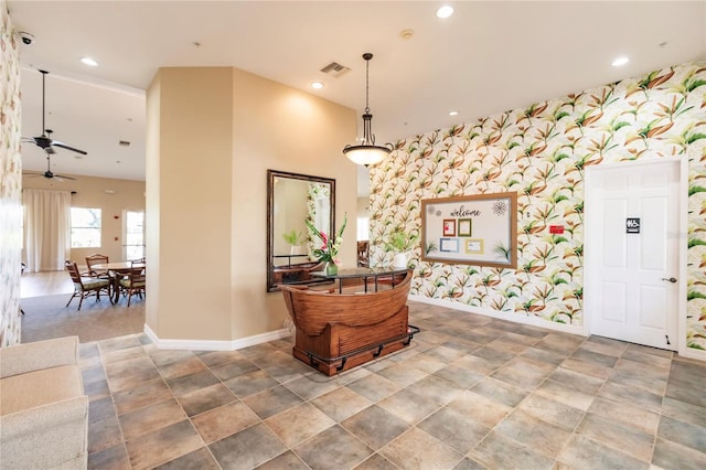 interior space featuring tile flooring and ceiling fan