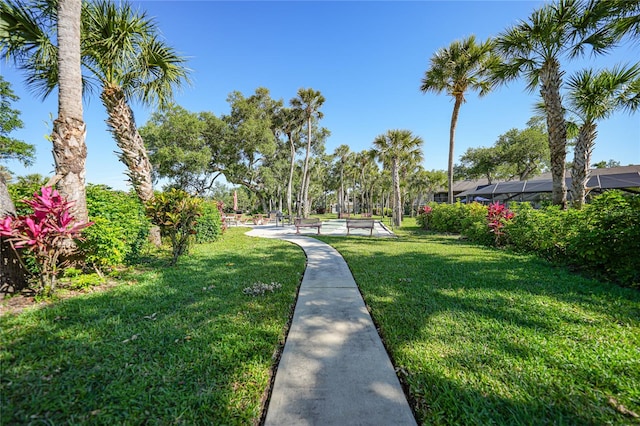 view of home's community featuring a yard