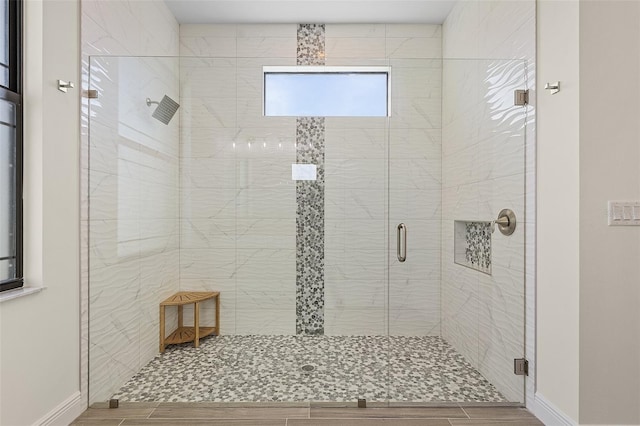 bathroom with an enclosed shower