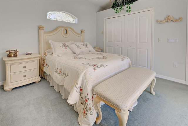 carpeted bedroom with a closet