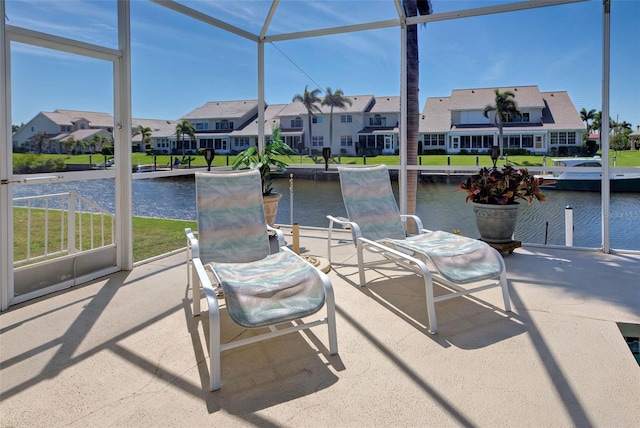 sunroom with a water view