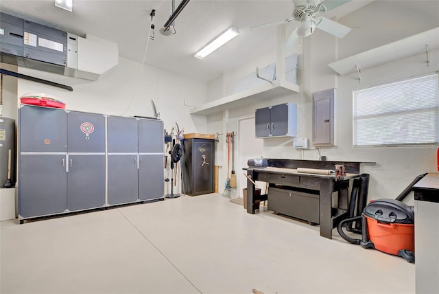 garage with electric panel and ceiling fan