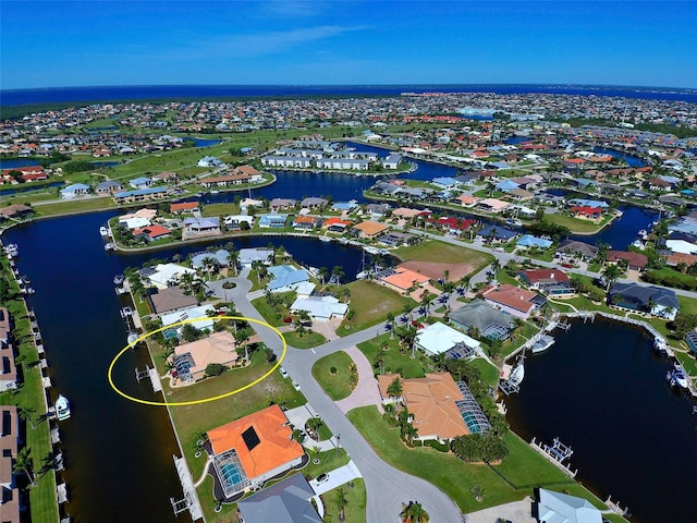 bird's eye view with a water view