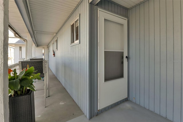 doorway to property featuring a porch