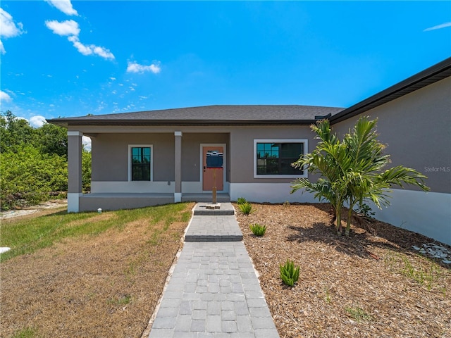 view of front of house with a front lawn