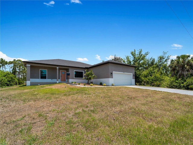 ranch-style house with a front lawn and a garage