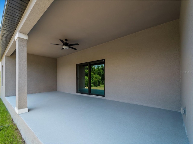 view of patio with ceiling fan