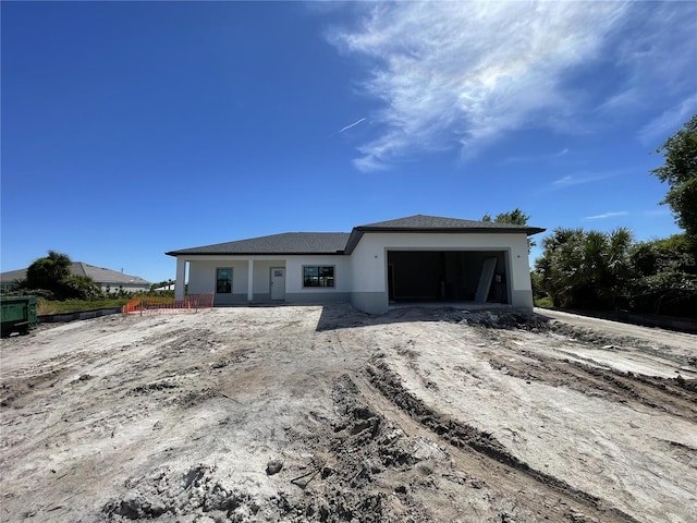 view of front of property featuring a garage