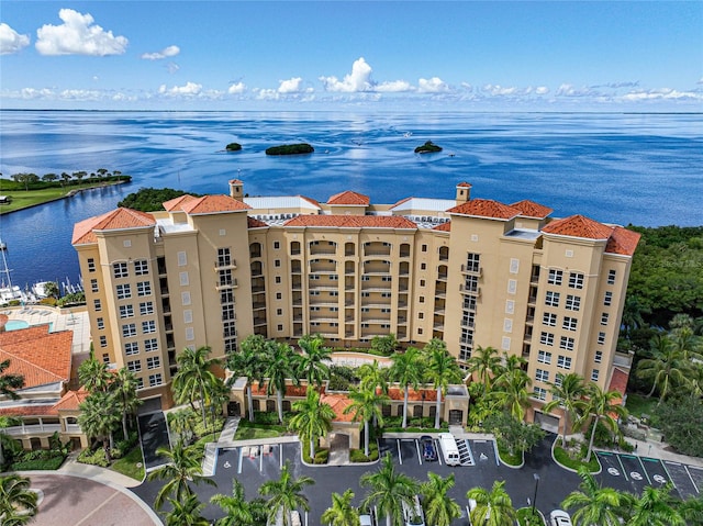 birds eye view of property featuring a water view