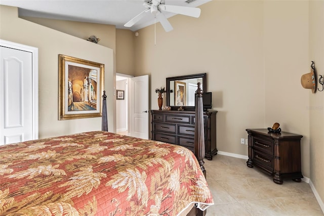 bedroom featuring high vaulted ceiling, ceiling fan, and light tile floors