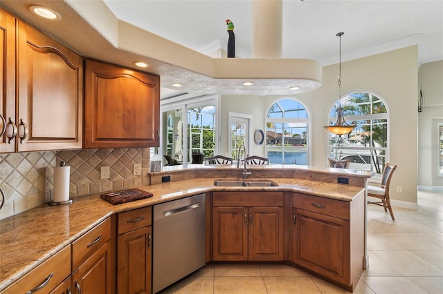 kitchen featuring sink, dishwasher, light tile flooring, light stone countertops, and tasteful backsplash