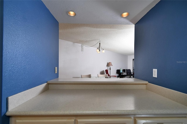 bathroom featuring a textured ceiling