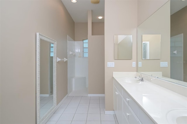 bathroom with tile patterned floors and vanity