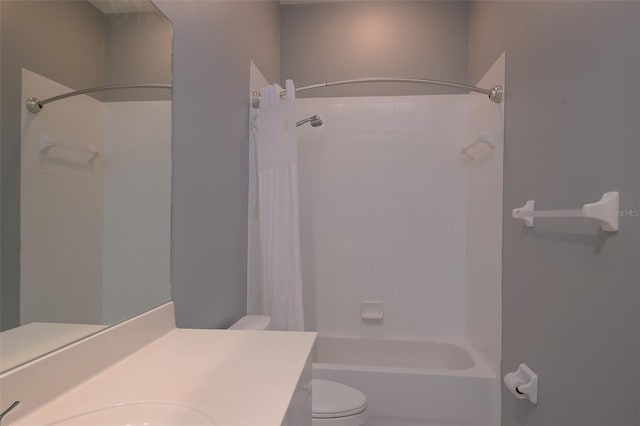 full bathroom featuring vanity, toilet, and shower / tub combo with curtain