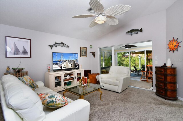 living room featuring light carpet, vaulted ceiling, and ceiling fan