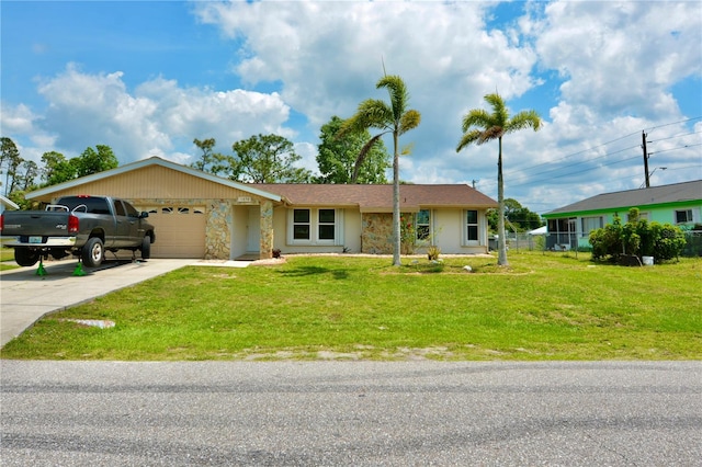 ranch-style home featuring a garage and a front yard