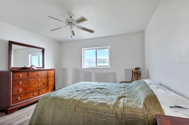 bedroom featuring ceiling fan and light wood-type flooring