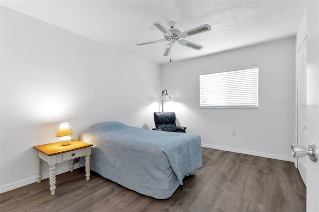 bedroom featuring hardwood / wood-style floors and ceiling fan