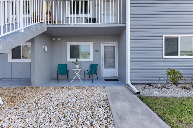 property entrance with a patio