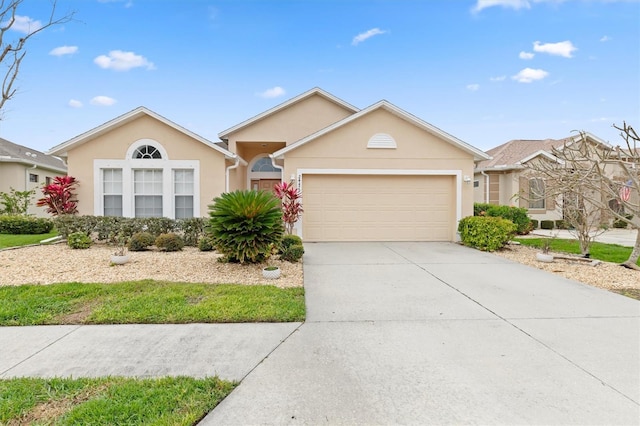 single story home with a garage