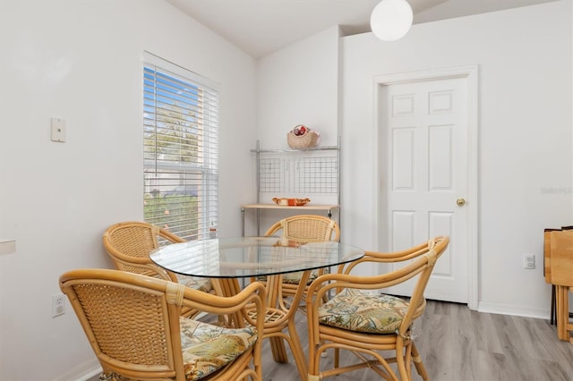 dining room with light wood-type flooring