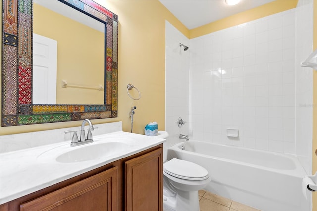 full bathroom featuring tile patterned floors, vanity, toilet, and tiled shower / bath