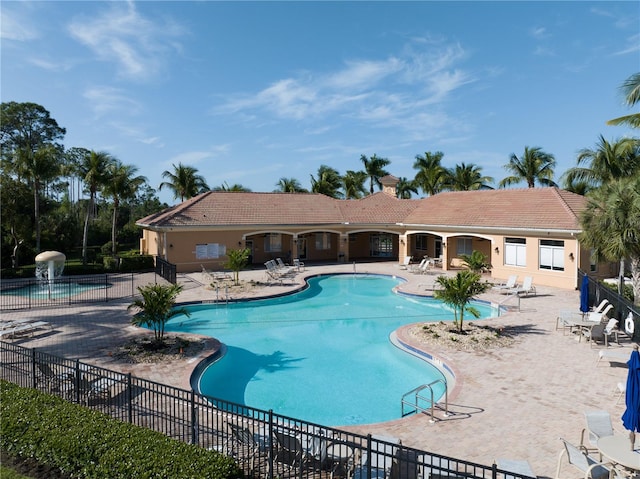 view of pool featuring a patio