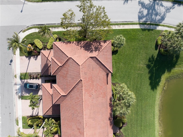 drone / aerial view featuring a water view