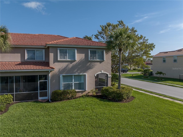 view of front of home with a front yard