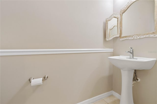 bathroom with tile patterned flooring