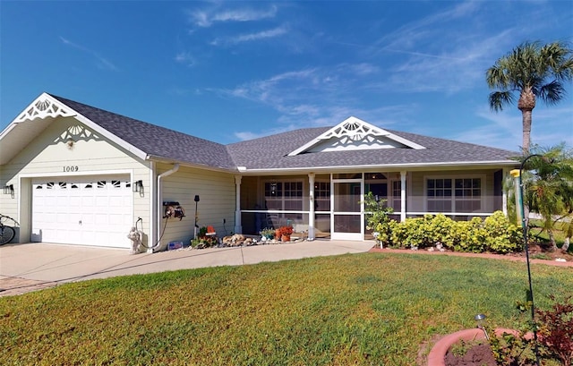 single story home featuring a garage and a front yard