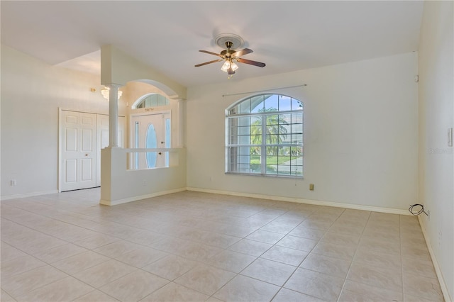 tiled empty room with ceiling fan