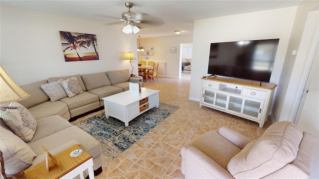 living room with ceiling fan