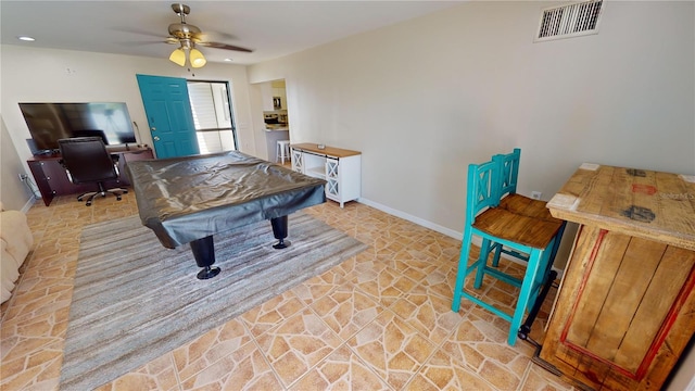 game room with pool table and ceiling fan