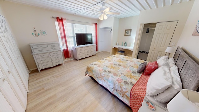 bedroom featuring ceiling fan, light hardwood / wood-style floors, and a closet