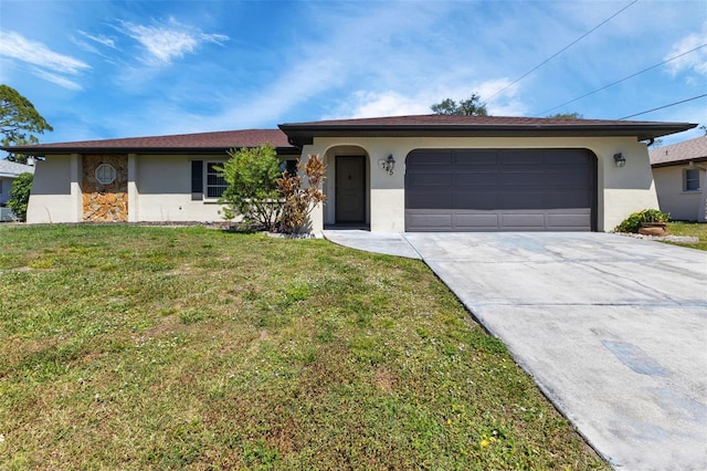 single story home with a garage and a front yard