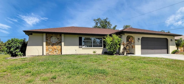 view of front facade featuring a garage and a front lawn