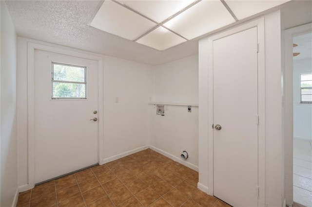 washroom featuring washer hookup and electric dryer hookup