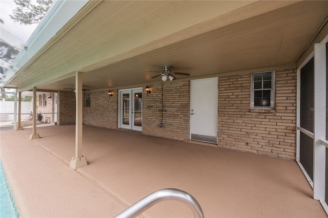 view of patio featuring ceiling fan and french doors