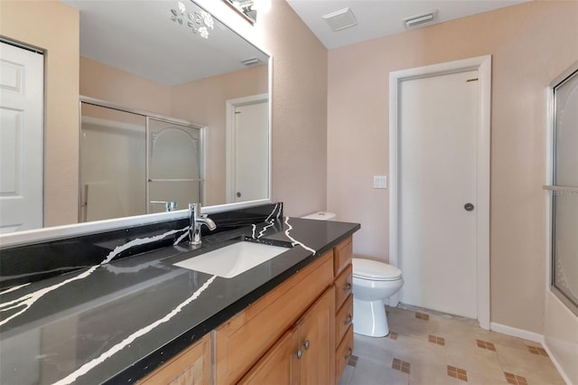 full bathroom with shower / bath combination with glass door, tile flooring, toilet, and vanity