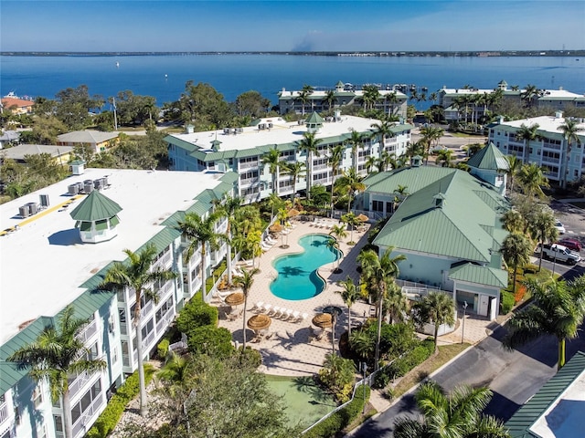 birds eye view of property featuring a water view