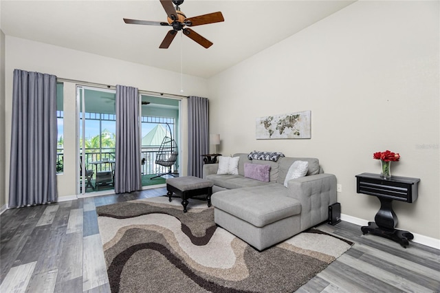 living room featuring hardwood / wood-style flooring and ceiling fan