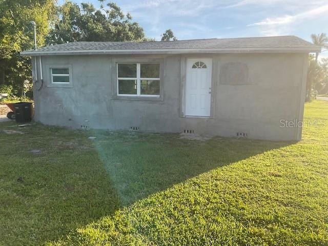 exterior space featuring a front yard