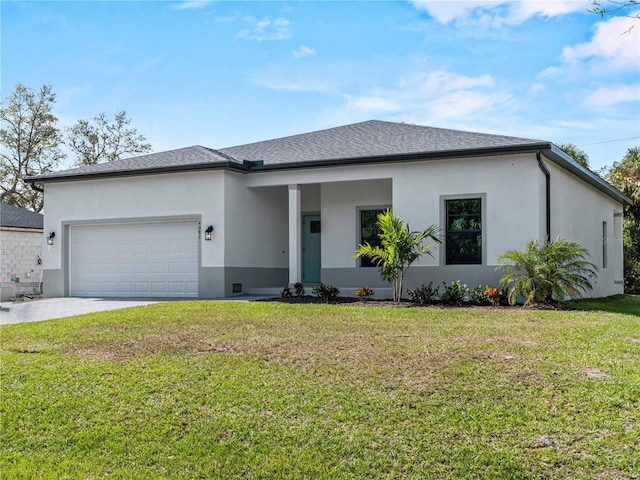 view of front facade featuring a garage and a front yard