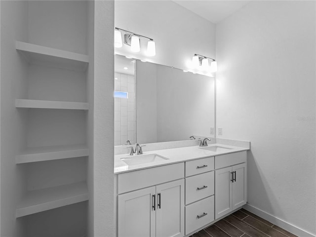 bathroom featuring vanity and hardwood / wood-style flooring