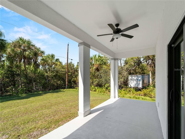 view of patio / terrace featuring ceiling fan