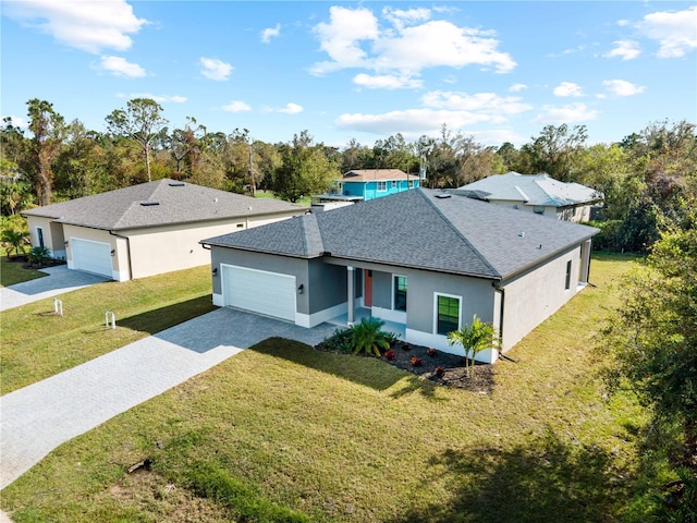 view of front of property featuring a garage and a front yard